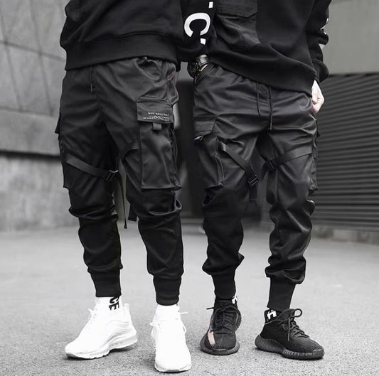 🔥 Urban Recon Tactical Joggers

These joggers have that edgy, street-meets-utility look — clean black, adjustable straps, cargo-style pockets — very urban drip and functional.